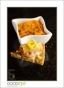 Mac n Cheese: Spanish Chorizo & Manchego-stuffed Rigatoni on a Garlic Crostini smothered with Mornay Sauce