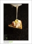 Mac n Cheese: Spanish Chorizo & Manchego-stuffed Rigatoni on a Garlic Crostini smothered with Mornay Sauce