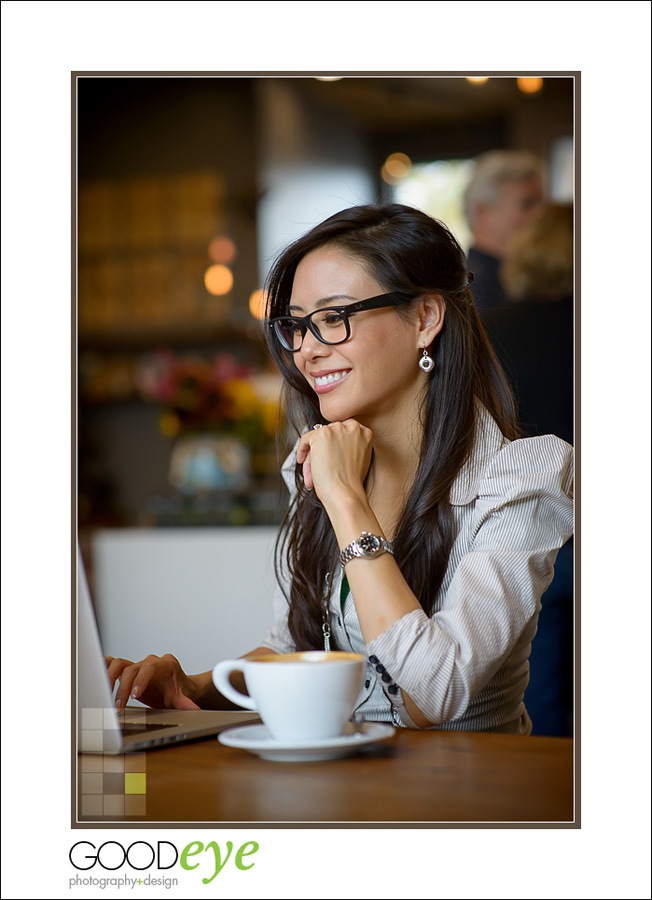 business portrait of attractive asian businesswoman using a laptop in a coffeeshop