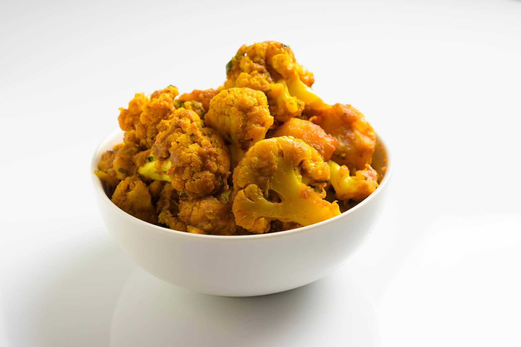 These are photos of Indian food bowls for Curry Root, a new restaurant